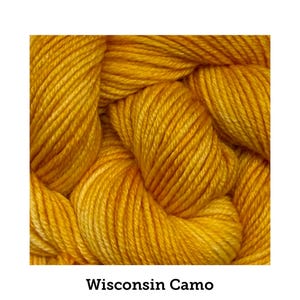 May include: Close-up of a skein of yellow yarn. The yarn is a vibrant shade of gold, with visible strands and a textured surface. The text "Wisconsin Camo" is displayed below the yarn.