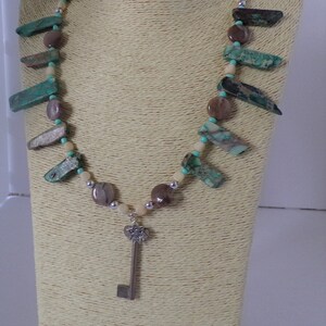 Star and Key Pendant: Blue-Green Beads (Neutral Palette)