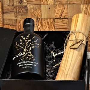 Gift box of olive wood salt or pepper mill and a magnificent bottle of Extra Virgin Olive Oil Tunisia