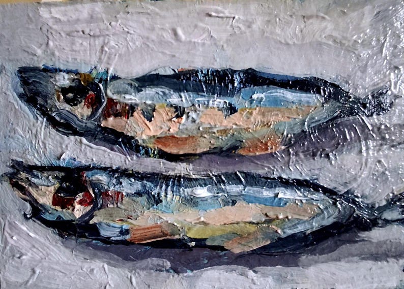 May include: Oil painting of two fish, rendered with thick brushstrokes. The fish are primarily blue, with accents of orange, brown, and white. The background is a textured, light gray. The artwork has a rustic, impressionistic style.