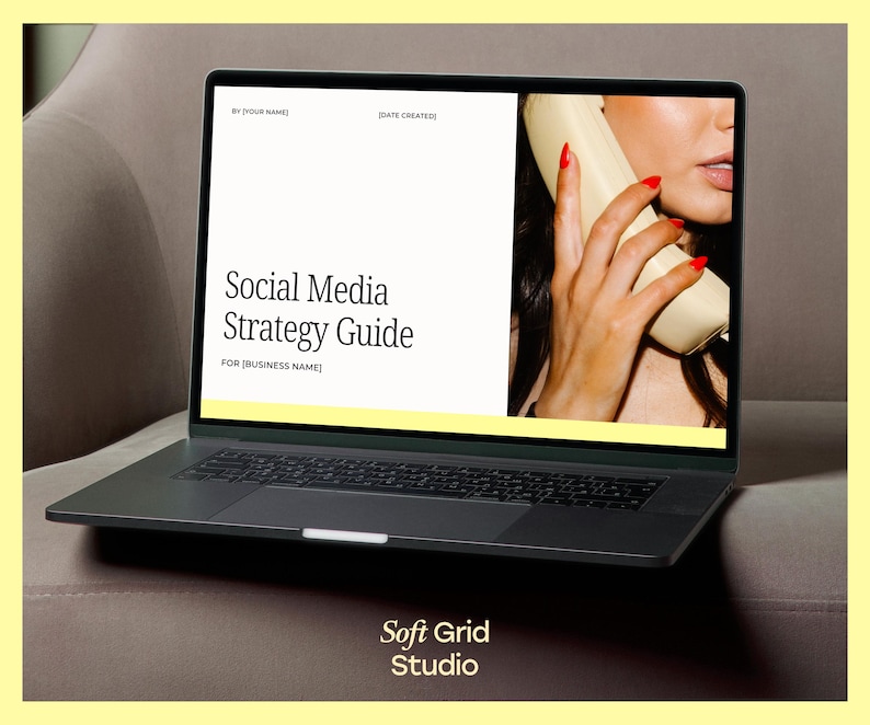 May include: A laptop computer displaying a social media strategy guide with the text "Social Media Strategy Guide" and "FOR [BUSINESS NAME]" on a white background. The right side of the screen shows a woman holding a vintage phone with red nail polish.