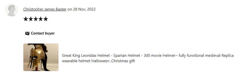 May include: A gold-colored Spartan helmet with a black plume, displayed on a stand. The helmet is a replica of the Great King Leonidas helmet, suitable for Halloween or as a Christmas gift.