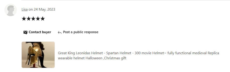 May include: A gold-colored Spartan helmet with a black plume, displayed on a red stand. The helmet is a replica of the one worn by King Leonidas in the movie "300". The image includes text that says "Great King Leonidas Helmet".