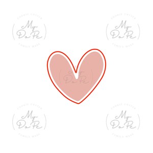 May include: A red heart-shaped cookie cutter with a pink outline. The cookie cutter is surrounded by four white circles with the text "COOKIE CUTTER My Do Pe FAMILY MADE" in grey text.