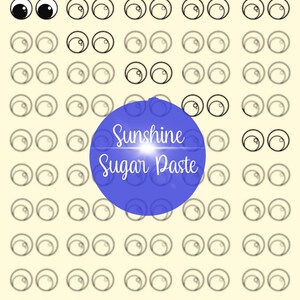 May include: A sheet of googly eye transfers for royal icing. The sheet features numerous pairs of black and white eyes, with a few solid black eyes. The text "Sunshine Sugar Paste" is in a blue circle. The text "Sunshinesugarpaste on Etsy" and "Royal Icing Transfer - Googly Eyes" are also present.