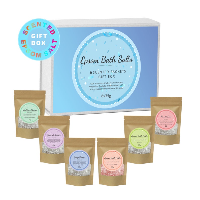 May include: A gift box of six 35g sachets of Epsom bath salts, each with a different scent. The scents are: Total De-Stress, Calm & Soothe, Sleep Better, Epsom Bath Salts, Green Bath Salts, and Muscle Ease. The box is blue and has a white circle with the text "Epsom Bath Salts" and "6 Scented Sachets Gift Box".