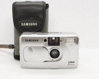 Vintage Samsung FINO 15 DLX Apuntar y disparar cámara de película de 35 mm década de 1990