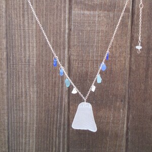 Patterned white pendant sea glass necklace with blue drops image 1