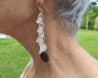 Elegant white dangle earrings with violet drop