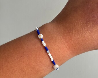 September collection. Royal blue celestial collection. Dainty GLASS BEAD BRACELETS. Pinstripe beads. Friendship bracelets. Gifts for friends