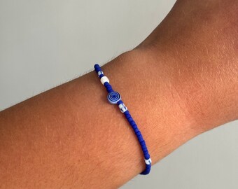 September collection. Royal blue celestial collection. Dainty GLASS BEAD BRACELETS. Pinstripe beads. Friendship bracelets. Gifts for friends