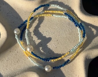 COLOURFUL SEED BEAD bracelets on elastic string. Multi coloured jewelry / bracelets. Summer friendship bracelets. Beach bracelets.