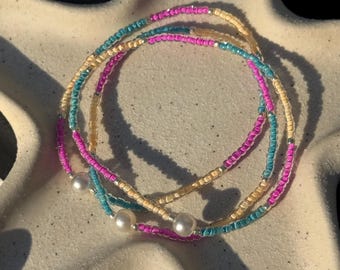 COLOURFUL SEED BEAD bracelets on elastic string. Multi coloured jewelry / bracelets. Summer friendship bracelets. Beach bracelets.