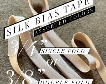 Assorted colors • 100% silk charmeuse satin bias tape • 0.75 inch single fold or 0.375 inch double fold • By the yard