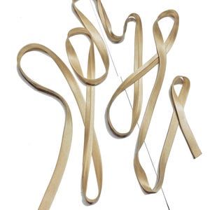 Silk charmeuse satin bias tape • Single or double fold • Pale Gold • Short segments • By the yard