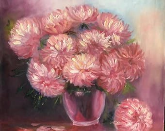May include: A bouquet of pink flowers in a pink vase. The flowers are arranged in a loose, natural style, and the vase is simple and elegant. The background is a soft, blurred pink.