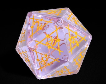 May include: A purple twenty-sided die with gold numbers and stars. The die is made of clear plastic and has a geometric shape.