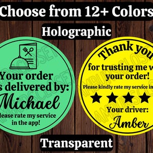 May include: Two round stickers with black text on a green and yellow background. The green sticker says "Your order was delivered by: Michael. Please rate my service in the app!" The yellow sticker says "Thank you for trusting me with your order! Please kindly rate my service in the app! ★★★★ Your driver: Amber"