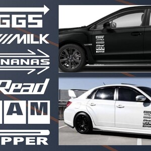 May include: White vinyl decals featuring the words "EGGS", "MILK", "BANANAS", "BREAD", "HAM", and "PEPPER" in a bold, stylized font. The decals are displayed on a black and a white car, suggesting they are car accessories.