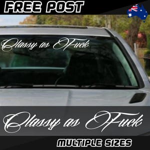May include: White vinyl car sticker with the text "Classy as Fuck" in a cursive font. The sticker is shown on a car windscreen. The words "FREE POST" and "MULTIPLE SIZES" are also visible.