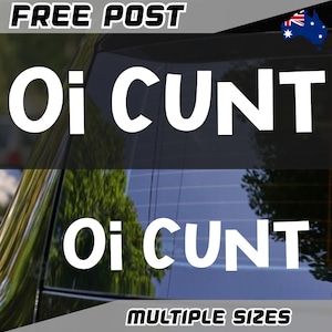 May include: White vinyl decal displaying the words "Oi CUNT" in a bold, sans-serif font. The decal is shown on a car window. The text "FREE POST" and "MULTIPLE SIZES" are also visible.