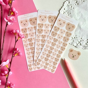 Feuille d'autocollants ours | Adorables autocollants tête d'ours en peluche, autocollants déco polco à chargement par le dessus, carte journalière de style coréen bujo