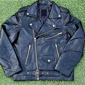 May include: A black leather motorcycle jacket with a zipper closure and multiple pockets. The jacket has a classic biker style with a stand-up collar and a belt at the waist.