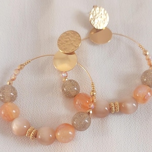 Colorful hoop earrings and pearls