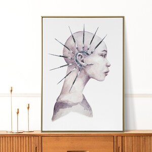 May include: A watercolor painting of a person with a shaved head and a large, intricate metal piece attached to their ear. The metal piece has many sharp points that radiate out from the ear. The person is looking to the right, and their face is painted in a soft, muted palette of pinks and purples.