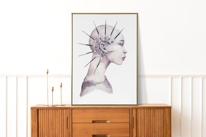 May include: A watercolor painting of a person with a shaved head and a large, intricate metal piece attached to their ear. The metal piece has many sharp points that radiate out from the ear. The person is looking to the right, and their face is painted in a soft, muted palette of pinks and purples.