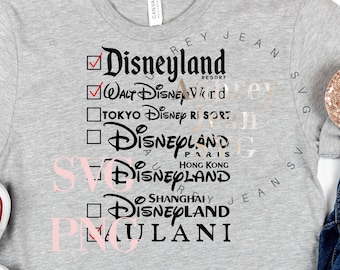 May include: A gray t-shirt with a checklist of Disney parks, including Disneyland, Walt Disney World, Tokyo Disney Resort, Disneyland Paris, Hong Kong Disneyland, Shanghai Disneyland, and Aulani. The text is in black and the checklist boxes are in black with checkmarks in some of the boxes. The t-shirt is on a white background.