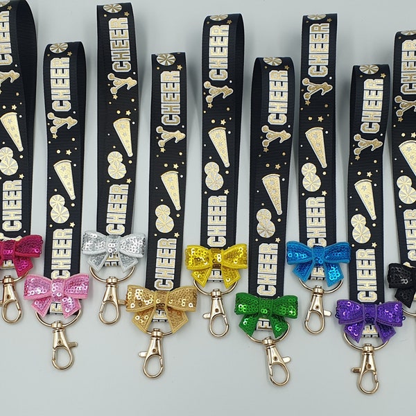 Cheer Mini-Schlüsselanhänger mit Schleife, Cheerleading-Schlüsselanhänger, schwarzem Armband und normalem Cheercoach-Ausweis
