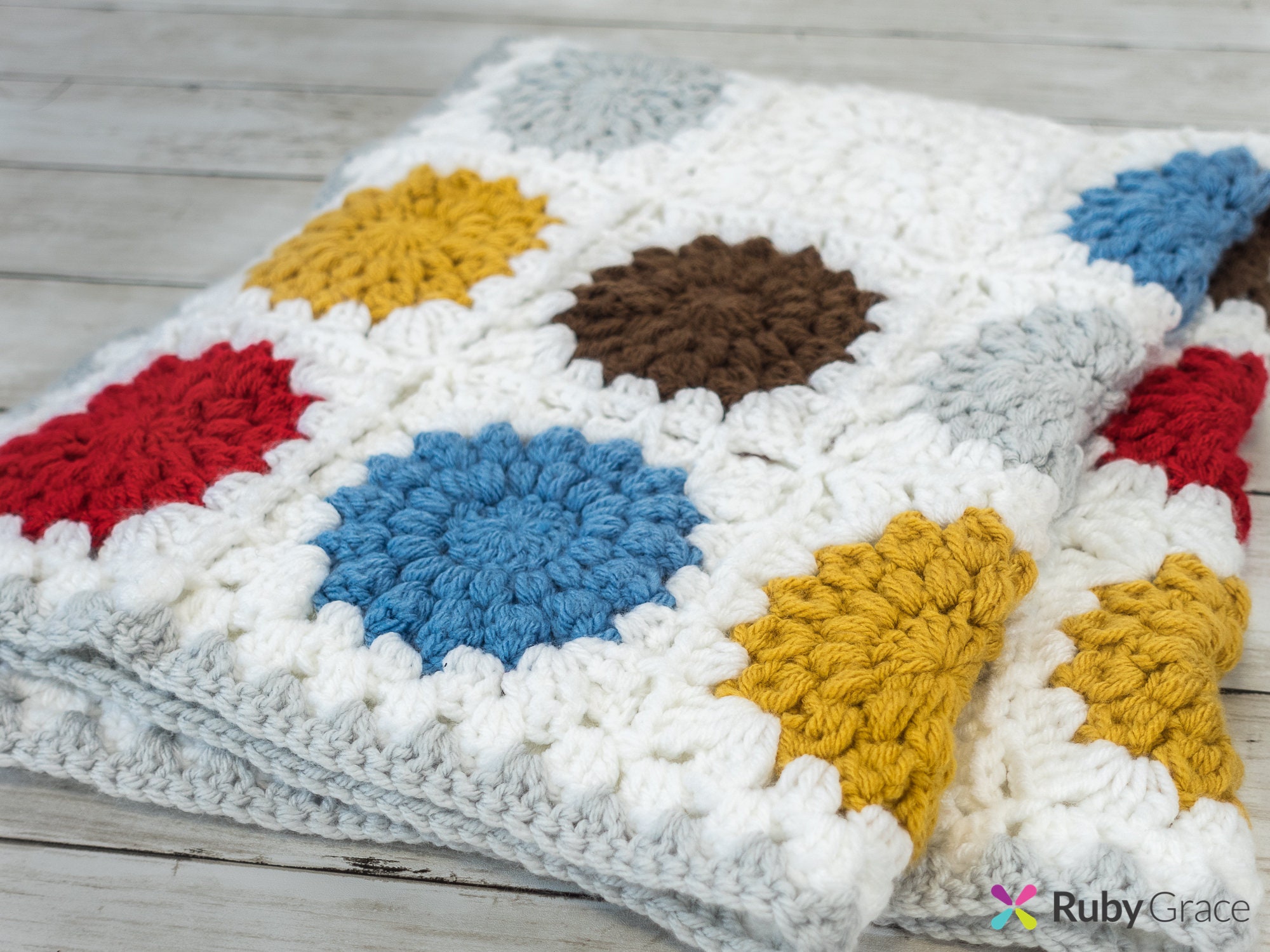 38 Sunburst Crochet Patterns for Blankets, Bags, Tops, and Home Decor 22 Scandanavia-ish Sunburst Granny Square Crochet Blanket