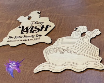 May include: Two wooden ornaments shaped like a cruise ship. The first ornament is a silhouette of the Disney Wish cruise ship with the text "Disney Wish" and "The Ruka Family Trip Halloween on the High Seas 2023". The second ornament is a detailed outline of a cruise ship with Mickey Mouse ears on the smokestack.