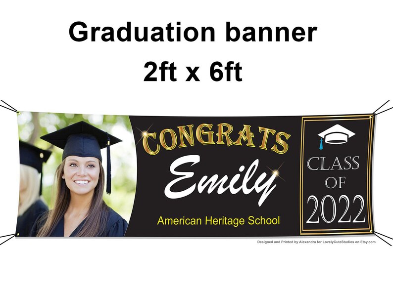 May include: A black and gold graduation banner with the text "CONGRATS Emily American Heritage School CLASS OF 2022". A photo of a graduate in a cap and gown is on the left side of the banner.