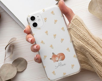 May include: A white phone case with a sleeping fox design and a yellow floral pattern. The case has the name "Alex" printed on it.