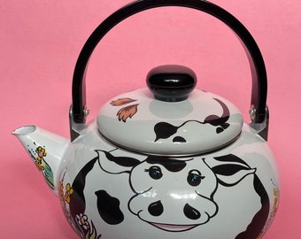 Vintage enamelware cow teapot