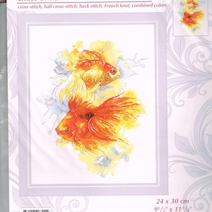 May include: Cross-stitch pattern for two goldfish, one orange and one yellow, swimming in a watercolour-style background. The pattern is 9 1/2 inches by 11 3/4 inches and is made with stranded cotton.