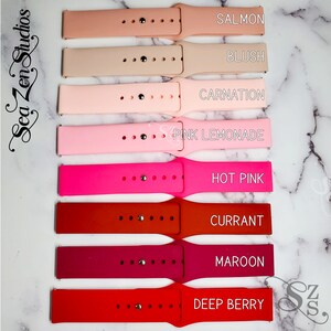 May include: Eight silicone watch bands in various shades of pink and red. The bands are labeled with the following colors: Salmon, Blush, Carnation, Pink Lemonade, Hot Pink, Currant, Maroon, and Deep Berry.