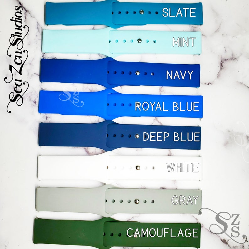 May include: Eight different colored silicone watch bands with white text labels: Slate, Mint, Navy, Royal Blue, Deep Blue, White, Gray, and Camouflage.