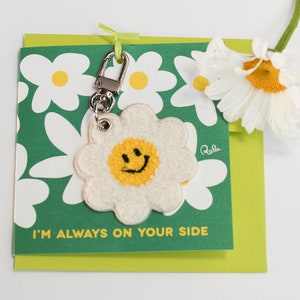 Madeliefjekaart (I'm always on your side) + Daisy-sleutelhangers | Wenskaart: