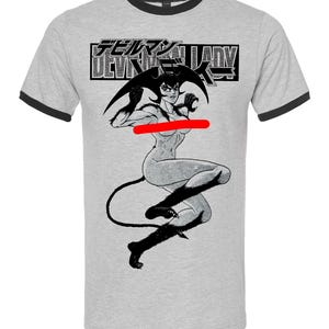 May include: Gray ringer t-shirt with black trim featuring a black and white illustration of a female demon with the text "DEVILMAN LADY" in Japanese. The graphic depicts a dynamic pose.