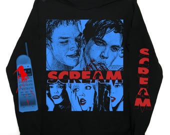 May include: Black long-sleeve shirt featuring a blue and red graphic design. The design includes images of people, the word "SCREAM", and a phone with blood splatter. The word "SCREAM" is also printed on the sleeve.