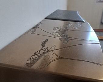 Pendant console, plated in bronze