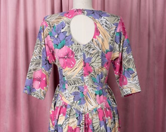 Robe années 80 en coton à fleurs, boutonnée sur le devant, découpe goutte d'eau dans le dos, liens sur les côtés et poches (M/L)