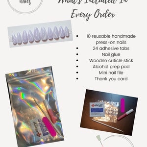 May include: A set of 10 reusable press-on nails with a white and light purple swirl design. The set includes 24 adhesive tabs, nail glue, a wooden cuticle stick, an alcohol prep pad, a mini nail file, and a thank you card.