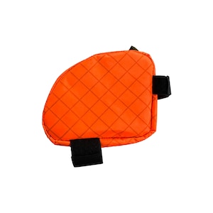 May include: Orange and black quilted bike saddle bag with a velcro strap.