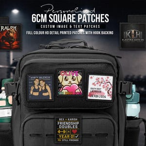 May include: A black tactical backpack featuring multiple square 6cm patches with custom full-colour prints and text. The patches display various designs including a dog, cherry blossoms, and text like 'RALPH', 'OLIVE', and 'FRIENDSHIP DOUBLES'.