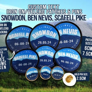 May include: A selection of blue and white round iron-on or velcro patches featuring the names of mountains: Scafell Pike, Snowdon, and Ben Nevis. The patches are available in two sizes: 6 cm and 7.5 cm. A gold pin with a diameter of 2.5 cm is also included.
