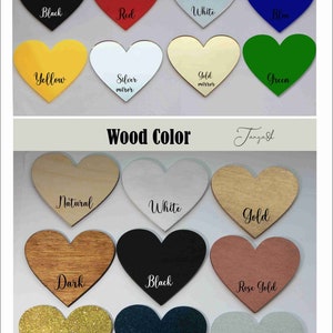 May include: Image showcasing heart-shaped color samples. The top section displays acrylic colors: black, red, white, blue, yellow, silver mirror, gold mirror, and green. The bottom section features wood colors: natural, white, gold, dark, black, rose gold, glitter gold, navy blue, and silver.